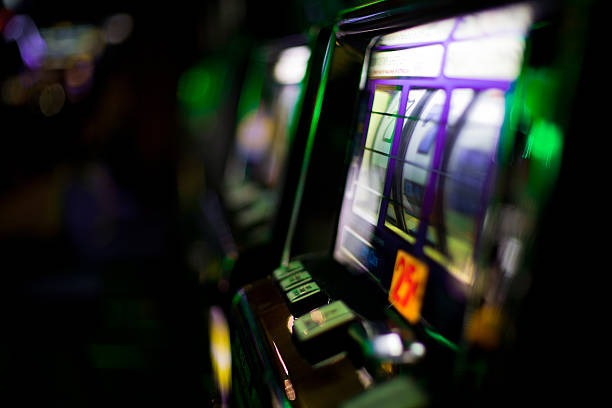 one-hundred-fifty-six mobile app interface showing football markets and slot games
